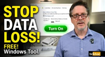 Video thumbnail showing a man in a blue plaid shirt next to large text reading 'STOP DATA LOSS! FREE! Windows Tool.' and a Windows File History window with a green 'Turn On' button.