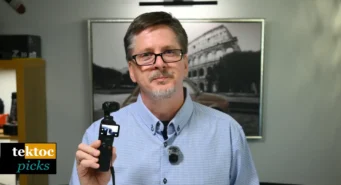 Man holding a DJI Osmo Pocket 3 vlogging camera, tektoc logo visible.